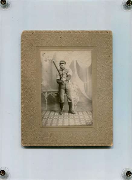 Early Base Ball Player Holding a Bat with Hands Backwards Studio Portrait