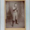 Early Base Ball Player with N on Jersey with a Glove and Ball Studio Portrait