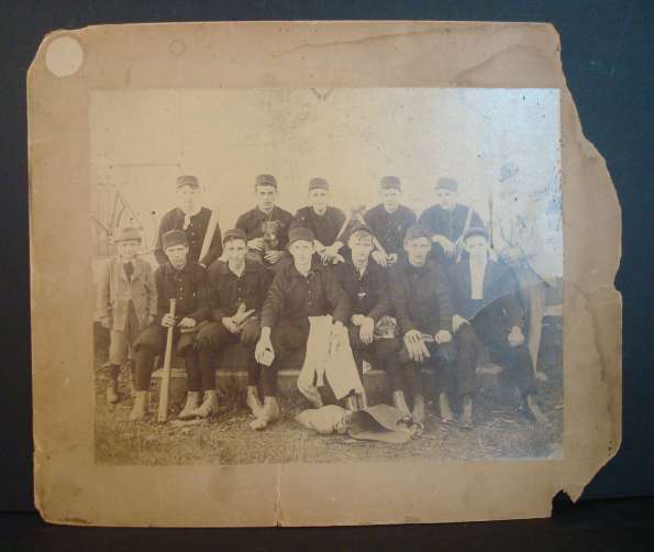 Early Base Ball Team in Black Uniforms with Dog and Tipped Finger Catchers Glove