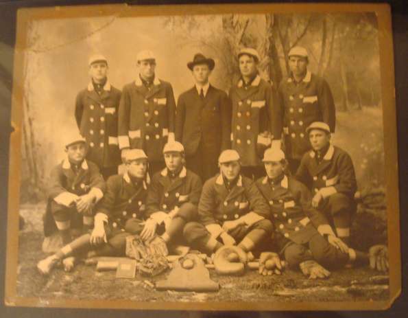 Early Base Ball Team in Dark Coats with White Buttons with Equipment