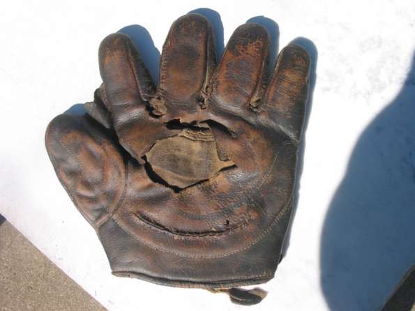 Early 1900's Hole in Palm Crescent Glove Front