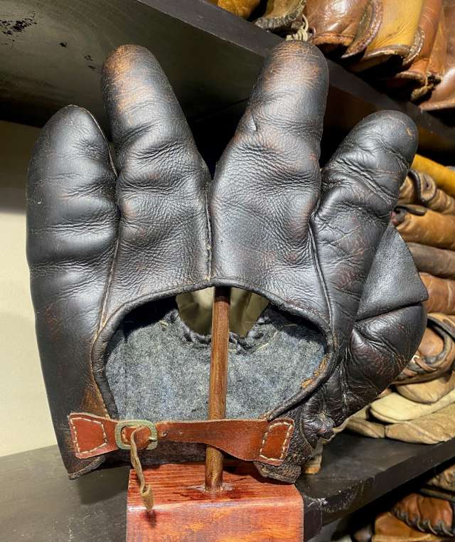 Early 1900's Hole in Palm Crescent Glove Back